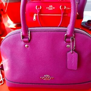 Pink coach satchel  perfect condition with one imperfection om handle last pitch